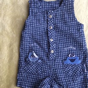 Sesame Street blue onesie with embroidered pockets